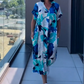👗50% RABATT! 🌸 Elegant V-halsad Klänning med Tryck för Kvinnor – Flytande Tyg, Smickrande Passform & Perfekt för Våren ☀️