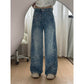 Dambyxor i denim med breda ben och blommönstrad jacquar